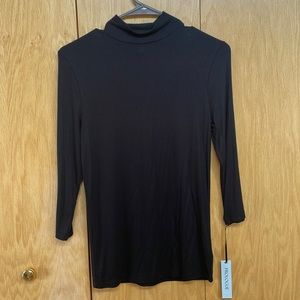 Prologue black turtle neck, small sleeves come up midway on arms. Not worn!
